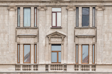 Obraz premium Several windows in a row on facade of the urban apartment building front view, St. Petersburg, Russia.