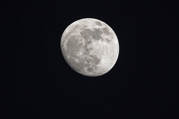 Big white Moon on dark night with copy space : shot at  1,260 mm. focal length.
No crop image Detailed.