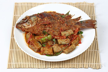 Deep-fried tilapia fish topped Spicy fried eggplant.