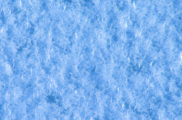 Fototapeta na wymiar Snowflakes on the ice.