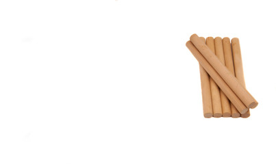 Round wooden blocks on a white background.