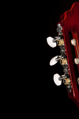 Obraz premium acoustic guitar, stringed instrument / lonely musical instrument which is a guitar on a black background
