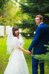 bride with veil smiling