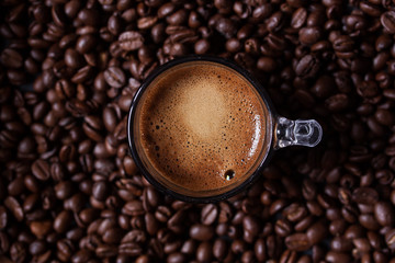espresso coffee on coffee beans background