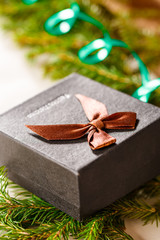 Christmas background with firtree branch and gift box