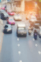 Blured of Vehicles move along the road in Thailand