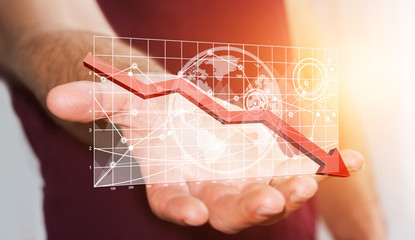 Businessman holding digital charts bars and red arrow