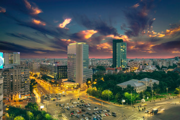 Sunset over Victoria Square. Center of Bucharest, Romania. Aerial view. Dramatic sky.