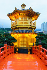 Naklejka premium The Pavilion of Absolute Perfection (Golden Pagoda) in Nan Lian Garden at Diamond Hill in Hong Kong vertical view
