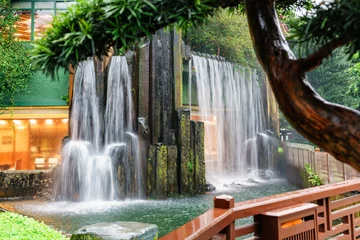 Rolgordijnen Artificial waterfall at The Nan Lian Garden in Hong Kong beautiful scenery © Wilding