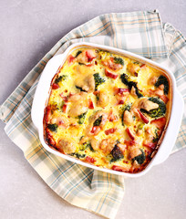 Broccoli, chicken and cheese bake in a tin