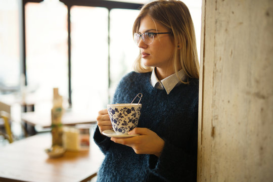 Attractive woman drinking coffee