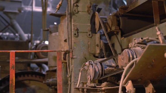 Brickfield. Close-up view of old working machine