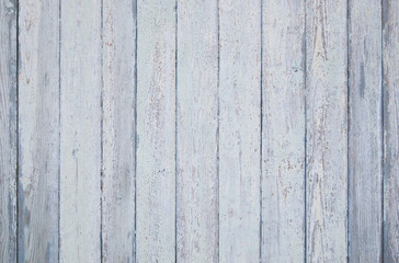 light green old wooden fence. wood palisade background. planks texture