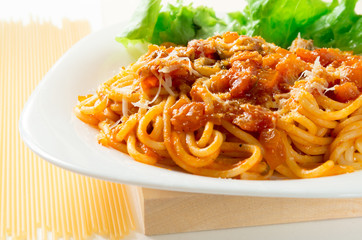 Italian cooked spaghetti with bolognese