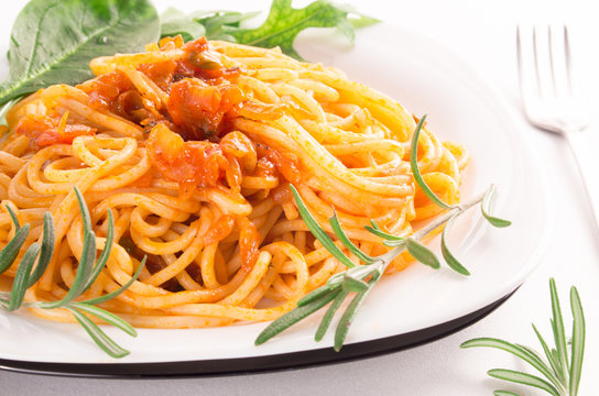 Italian spaghetti with vegetable sauce closeup