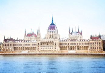 Fototapeta na wymiar facade of parliament building over river, Budapest, Hungary, retro toned