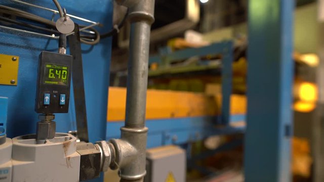 Brick production. View of machine's indicator