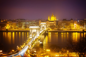 Fototapeta premium Chain Bridge Szechenyi lanchid and skyline of Pest at night from above, Budapest, Hungary, retro toned
