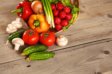 Fresh vegetables on a clean wooden table
