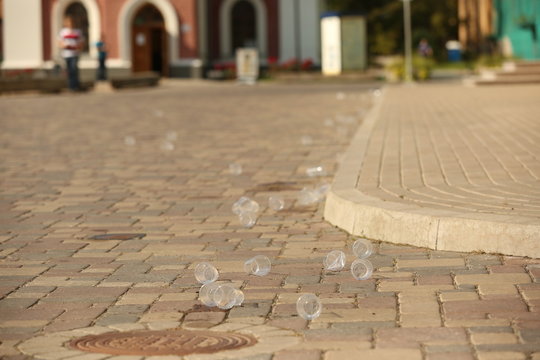 plastic cups on the pavement