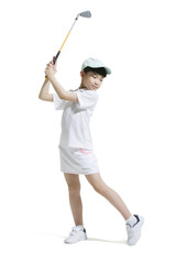Cute girl playing golf