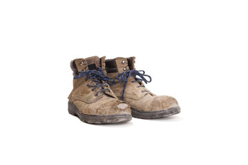 pair of old worker boots on white background