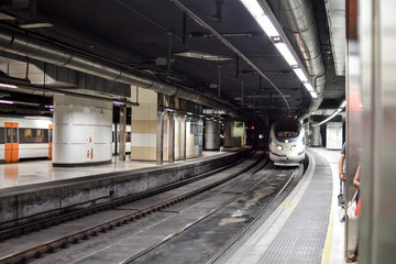 Subway train coming to a station