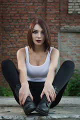  Young woman on a industrial factory