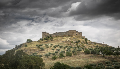 Fototapeta na wymiar Medieval castle in Medellin Village on a cloudy day, province of Badajoz, Spain