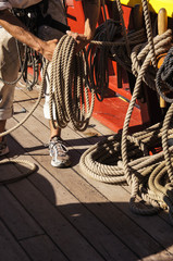 Sailor coils a line