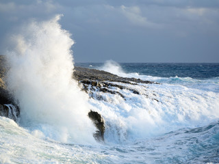 waves crashing on the rocks
