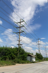 Electric transformer on blue sky. electric post isolated on blue sky