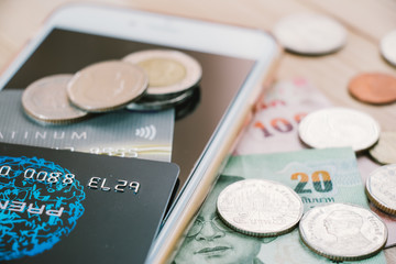 Credit card,  plastic money, put on smartphone.