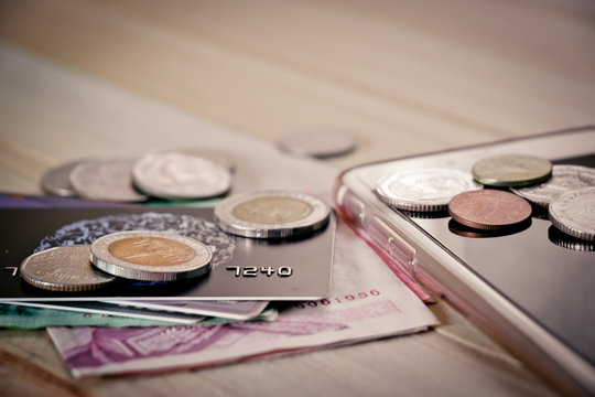 Credit card,  plastic money, put on smartphone.