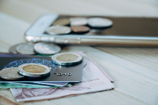 Credit card,  plastic money, put on smartphone.