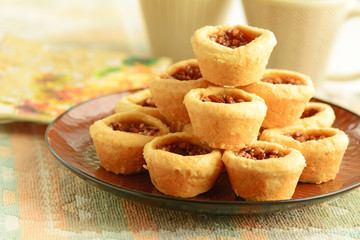 Pecan tarts and coffee