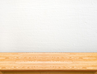 Empty wood table top with white concrete wall,Mock up for displa