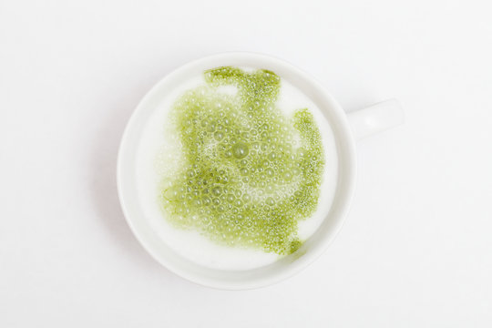Cup of matcha green tea latte