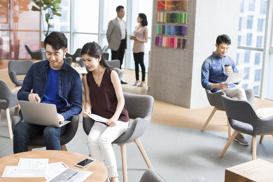 Business people working in office