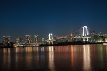 Fototapeta na wymiar Night view of Rainbow Bridge in Odaiba, Tokyo Bay