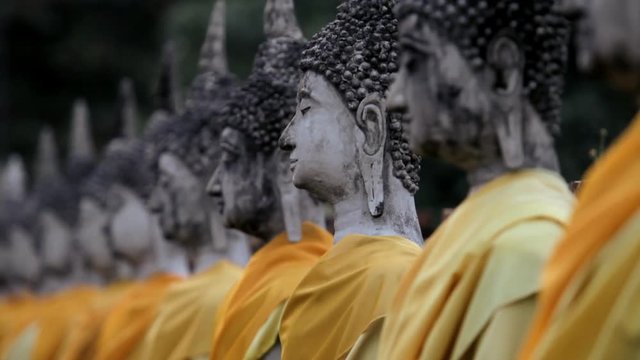 CU TU SELECTIVE FOCUS Meditating Buddha statues / Ayutthaya, Thailand