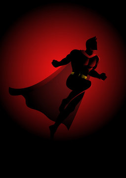 Superhero flying on dramatic red background