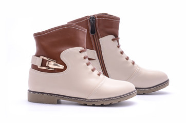 beige women ankle boots isolated on white