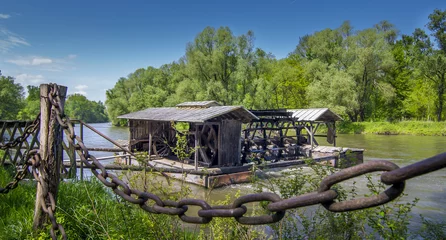 Zelfklevend Fotobehang Traditional water mill on Mura river, Slovenia © asafaric