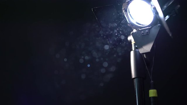 Photo equipment. View of dust in spotlight