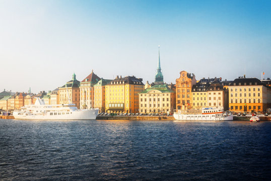waterfront architecture of old town Gamla Stan in Stockholm, Sweden, toned