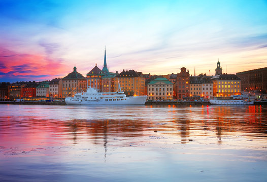colorful sunset scenery of the Old Town in Stockholm, Sweden, toned