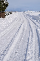 Fototapeta na wymiar 雪国の道路