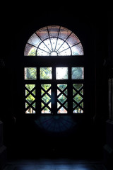 Silhouette of old window from the inside